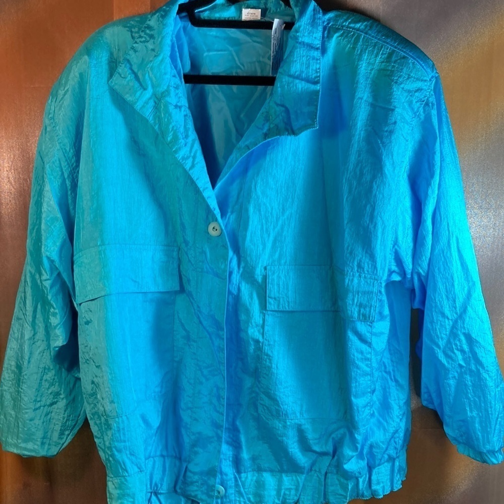 Black parachute 90’s windbreaker. One size. 48” chest. Huge shoulder pads! K.